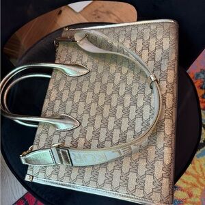 MICHAEL Michael Kors Gold Tote Bag with Structured Elegance